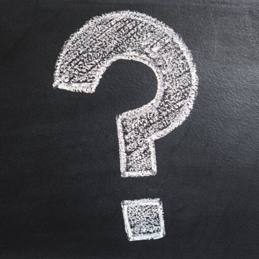Question mark written/drawn on a black board
